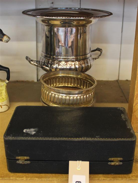 Plated wares - a wine cooler, a cased cruet set and 2 coasters